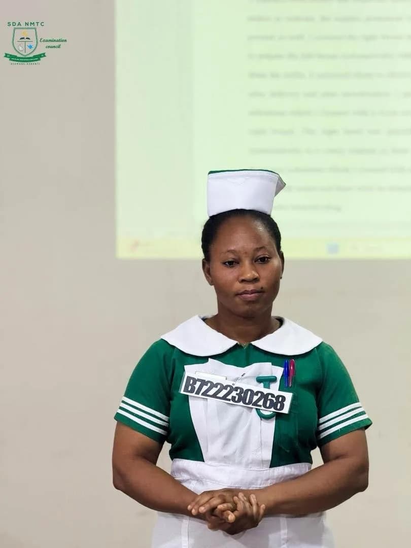SDA NMTC student in green and white nursing uniform with student ID badge